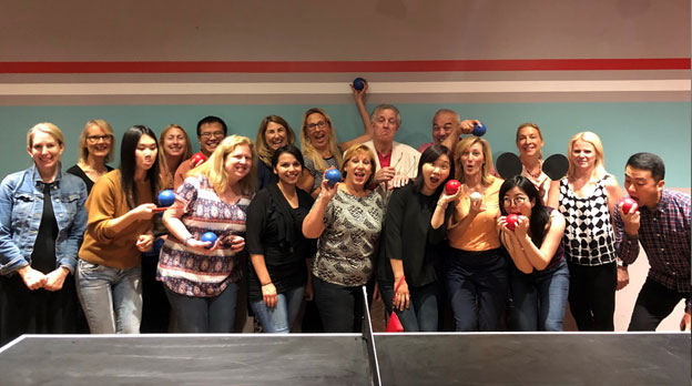 Photo of the team at a Bocce, Bowling, Ping Pong Night